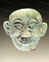 人面形饰